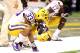 NEW ORLEANS, LA - JANUARY 09: Odell Beckham #33 and Morris Claiborne #17 of the Louisiana State University Tigers kneel on the sideline towards the end of their game against the Alabama Crimson Tide during the 2012 Allstate BCS National Championship Game at Mercedes-Benz Superdome on January 9, 2012 in New Orleans, Louisiana. (Photo by Andy Lyons/Getty Images)