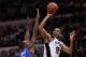 SAN ANTONIO, TX - MAY 29: Tim Duncan #21 of the San Antonio Spurs goes up for a shot over Serge Ibaka #9 of the Oklahoma City Thunder in the fourth quarter in Game Two of the Western Conference Finals of the 2012 NBA Playoffs at AT&T Center on May 29, 2012 in San Antonio, Texas. NOTE TO USER: User expressly acknowledges and agrees that, by downloading and or using this photograph, user is consenting to the terms and conditions of the Getty Images License Agreement. (Photo by Ronald Martinez/Getty Images)