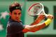 PARIS, FRANCE - MAY 30: Roger Federer of Switzerland plays a backhand during his men's singles second round match against Adrian Ungur of Romania during day four of the French Open at Roland Garros on May 30, 2012 in Paris, France. (Photo by Clive Brunskill/Getty Images)