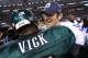ARLINGTON, TX - DECEMBER 24: Tony Romo #9 of the Dallas Cowboys greets Michael Vick #7 of the Philadelphia Eagles after a game at Cowboys Stadium on December 24, 2011 in Arlington, Texas. Romo suffered a hand injury during the first quarter of play against the Eagles. (Photo by Ronald Martinez/Getty Images)
