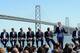 SAN FRANCISCO, CA - MAY 22: Lieutenant Governor of California Gavin Newsom, a former San Francisco Mayor, speaks as (L-R) David Stern, Rick Welts, Peter Guber, Joe Lacob, Mayor Edwin M. Lee, Ahmad Rashad and former NBA great Jerry West looks on at a press conference with the Golden State Warriors announcing plans to build a new sport and entertainment arena on the waterfront in San Francisco in time for the 2017-18 NBA Season on May 22, 2012 in San Francisco, California. (Photo by Thearon W. Henderson/Getty Images)