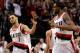 PORTLAND, OR - APRIL 23: Brandon Roy #7 high fives LaMarcus Aldridge #12 of the Portland Trail Blazers against the Dallas Mavericks in Game Four of the Western Conference Quarterfinals in the 2011 NBA Playoffs on April 23, 2011 at the Rose Garden in Portland, Oregon. NOTE TO USER: User expressly acknowledges and agrees that, by downloading and or using this photograph, User is consenting to the terms and conditions of the Getty Images License Agreement. (Photo by Jonathan Ferrey/Getty Images)