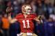 SAN FRANCISCO, CA - JANUARY 22: Alex Smith #11 of the San Francisco 49ers throws a pass against the New York Giants during the NFC Championship Game at Candlestick Park on January 22, 2012 in San Francisco, California. (Photo by Ezra Shaw/Getty Images)