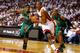MIAMI, FL - MAY 30: Mario Chalmers #15 of the Miami Heat drives in the second half past Rajon Rondo #9 and Ray Allen #20 of the Boston Celtics in Game Two of the Eastern Conference Finals in the 2012 NBA Playoffs on May 30, 2012 at American Airlines Arena in Miami, Florida. NOTE TO USER: User expressly acknowledges and agrees that, by downloading and or using this photograph, User is consenting to the terms and conditions of the Getty Images License Agreement. (Photo by Mike Ehrmann/Getty Images)