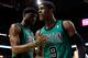 MIAMI, FL - MAY 30: Rajon Rondo #9 of the Boston Celtics reacts along with teammate Keyon Dooling #51 in the first half against the Miami Heat in Game Two of the Eastern Conference Finals in the 2012 NBA Playoffs on May 30, 2012 at American Airlines Arena in Miami, Florida. NOTE TO USER: User expressly acknowledges and agrees that, by downloading and or using this photograph, User is consenting to the terms and conditions of the Getty Images License Agreement. (Photo by Mike Ehrmann/Getty Images)