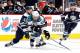 COLUMBUS, OH - JANUARY 14: Ryane Clowe #29 of the San Jose Sharks tries to gain control of the puck in front of Rick Nash #61 of the Columbus Blue Jackets at Nationwide Arena on January 14, 2012 in Columbus, Ohio. The San Jose Sharks won the game 2-1. (Photo by Gregory Shamus/Getty Images)