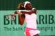 PARIS, FRANCE - MAY 28: Sloane Stephens of USA plays a backhand in the women's singles first round match between Ekaterina Makarova of Russia and Sloane Stephens of USA during day two of the French Open at Roland Garros on May 28, 2012 in Paris, France. (Photo by Clive Brunskill/Getty Images)