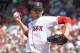 BOSTON, MA - MAY 27: Clay Buchholz #11 of the Boston Red Sox throws against the Tampa Bay Rays at Fenway Park May 27, 2012 in Boston, Massachusetts. (Photo by Jim Rogash/Getty Images)