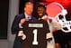 NEW YORK, NY - APRIL 26: Trent Richardson (R) from Alabama holds up a jersey as he stands on stage with NFL Commissioner Roger Goodell after he was selected #3 overall by the Cleveland Browns in the first round of the 2012 NFL Draft at Radio City Music Hall on April 26, 2012 in New York City. (Photo by Al Bello/Getty Images)