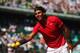 PARIS, FRANCE - MAY 29: Rafael Nadal of Spain collects some balls on in his men's singles first round match against Simone Bolelli of Italy during day 3 of the French Open at Roland Garros on May 29, 2012 in Paris, France. (Photo by Mike Hewitt/Getty Images)