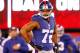 EAST RUTHERFORD, NJ - JANUARY 01: Osi Umenyiora #72 of the New York Giants looks on against the Dallas Cowboys at MetLife Stadium on January 1, 2012 in East Rutherford, New Jersey. (Photo by Rich Schultz/Getty Images)