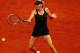 PARIS, FRANCE - JUNE 01: Maria Sharapova of Russia plays a forehand in her women's singles second round match against Ayumi Morita of Japan during day 6 of the French Open at Roland Garros on June 1, 2012 in Paris, France. (Photo by Clive Brunskill/Getty Images)