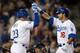 LOS ANGELES, CA - MAY 11: Andre Ethier #16 celebrates his homerun with Bobby Abreu #23 of the Los Angeles Dodgers in front of Ramon Hernandez #55 of the Colorado Rockies for a 6-1 lead during the seventh inning at Dodger Stadium on May 11, 2012 in Los Angeles, California. (Photo by Harry How/Getty Images)