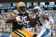 CHARLOTTE, NC - SEPTEMBER 18: Jermichael Finley #88 of the Green Bay Packers tries to make a catch against Captain Munnerlyn #41 of the Carolina Panthers during their game at Bank of America Stadium on September 18, 2011 in Charlotte, North Carolina. (Photo by Streeter Lecka/Getty Images)