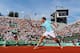 PARIS, FRANCE - JUNE 02: Richard Gasquet of France plays a backhand during his men's singles third round match against Tommy Haas of Germany during day seven of the French Open at Roland Garros on June 2, 2012 in Paris, France. (Photo by Mike Hewitt/Getty Images)