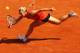 PARIS, FRANCE - MAY 28: Dominika Cibulkova of Slovakia stretches to hit a forehand in the women's singles first round match between Kristina Mladenovic of France and Dominika Cibulkova of Slovakia during day two of the French Open at Roland Garros on May 28, 2012 in Paris, France. (Photo by Clive Brunskill/Getty Images)