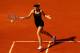PARIS, FRANCE - JUNE 02: Maria Sharapova of Russia plays a forehand in her women's singles third round match against Shuai Peng of China during day 7 of the French Open at Roland Garros on June 2, 2012 in Paris, France. (Photo by Clive Brunskill/Getty Images)