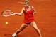 PARIS, FRANCE - JUNE 03: Dominika Cibulkova of Slovakia plays a forehand in her women's singles fourth round match against Victoria Azarenka of Belarus during day 8 of the French Open at Roland Garros on June 3, 2012 in Paris, France. (Photo by Matthew Stockman/Getty Images)