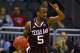 KANSAS CITY, MO - MARCH 07: Dash Harris #5 of the Texas A&M Aggies brings the ball up court against Oklahoma Sooners during the first round of the Big 12 Basketball Tournament March 07, 2011 at Sprint Center in Kansas City, Missouri. (Photo by Ed Zurga/Getty Images)