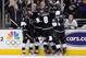 LOS ANGELES, CA - JUNE 04: Drew Doughty #8 of the Los Angeles Kings joins the celebration with Dustin Brown #23, Anze Kopitar #11, Justin Williams #14 after Kopitar's goal as teammate Rob Scuderi #7 looks on in the second period of Game Three of the 2012 Stanley Cup Final against the New Jersey Devils at Staples Center on June 4, 2012 in Los Angeles, California. (Photo by Harry How/Getty Images)
