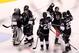 LOS ANGELES, CA - JUNE 04: (L-R) Goaltender Jonathan Quick #32, Dustin Brown #23, Willie Mitchell #33, Jarret Stoll #28, Drew Doughty #8 and Dustin Penner #25 of the Los Angeles Kings congratulate one another after Game Three of the 2012 Stanley Cup Final against the New Jersey Devils at Staples Center on June 4, 2012 in Los Angeles, California. The Kings defeated the Devils 4-0. (Photo by Christian Petersen/Getty Images)