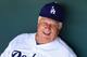 GLENDALE, AZ - MARCH 08: Former manager Tommy Lasorda of the Los Angeles Dodgers sits in the dugout during the spring training game against the Milwaukee Brewers at Camelback Ranch on March 30, 2012 in Glendale, Arizona. (Photo by Christian Petersen/Getty Images)