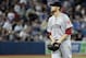 TORONTO, CANADA - JUNE 3: Daniel Bard #51 of the Boston Red Sox walks to the dugout after getting pulled after hitting Edwin Encarnacion of the Toronto Blue Jays during MLB action at The Rogers Centre June 3, 2012 in Toronto, Ontario, Canada. (Photo by Abelimages/Getty Images)
