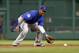 PITTSBURGH, PA - MAY 26: Starlin Castro #13 of the Chicago Cubs fields a ground ball against the Pittsburgh Pirates during the game on May 26, 2012 at PNC Park in Pittsburgh, Pennsylvania. (Photo by Justin K. Aller/Getty Images)
