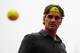 PARIS, FRANCE - JUNE 05: Roger Federer of Switzerland is thrown a ball in his men's singles quarter final match against Juan Martin Del Potro of Argentina during day 10 of the French Open at Roland Garros on June 5, 2012 in Paris, France. (Photo by Mike Hewitt/Getty Images)
