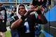 CHARLOTTE, NC - DECEMBER 24: Cam Newton #1 of the Carolina Panthers celebrates with fans after the game against the Tampa Bay Buccaneers at Bank of America Stadium on December 24, 2011 in Charlotte, North Carolina (Photo by Scott Cunningham/Getty Images)