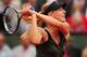 PARIS, FRANCE - JUNE 06: Maria Sharapova of Russia plays a backhand in her women's singles quarter final match against Kaia Kanepi of Estonia during day 11 of the French Open at Roland Garros on June 6, 2012 in Paris, France. (Photo by Mike Hewitt/Getty Images)