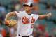 BALTIMORE, MD - MAY 22: Starting pitcher Brian Matusz #17 of the Baltimore Orioles throws to a Boston Red Sox batter during the first inning at Oriole Park at Camden Yards on May 22, 2012 in Baltimore, Maryland. (Photo by Rob Carr/Getty Images)