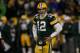 GREEN BAY, WI - JANUARY 15: Aaron Rodgers #12 of the Green Bay Packers looks on in the third quarter against the New York Giants during their NFC Divisional playoff game at Lambeau Field on January 15, 2012 in Green Bay, Wisconsin. (Photo by Jonathan Daniel/Getty Images)