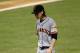 A dejected Tim Lincecum walks off the mound after his start against the Marlins on May 25.