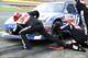 Pit crew members work on the No. 16 Ford for Greg Biffle at Charlotte. Credit: David Yeazell at Racetake.com