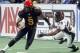 UNIONDALE, NY - FEBRUARY 26: Maurice Brown #9 of the New York Dragons eludes Kenny McEntyre #28 of the Orlando Predators during their arena football game on February 26, 2006 at Nassau Coliseum in Uniondale, New York. The Dragons defeated the Predators 55-35. (Photo by Jim McIsaac/Getty Images)