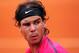 PARIS, FRANCE - JUNE 06: Rafael Nadal of Spain looks on during a break in his men's singles quarter final match against Nicolas Almagro of Spain during day 11 of the French Open at Roland Garros on June 6, 2012 in Paris, France. (Photo by Mike Hewitt/Getty Images)