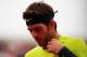 PARIS, FRANCE - JUNE 05: Juan Martin Del Potro of Argentina reacts in his men's singles quarter final match against Roger Federer of Switzerland during day 10 of the French Open at Roland Garros on June 5, 2012 in Paris, France. (Photo by Mike Hewitt/Getty Images)