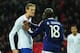 LONDON, ENGLAND - NOVEMBER 17: Peter Crouch (L) of England argues with Alou Diarra (R) of France during the international friendly match between England and France at Wembley Stadium on November 17, 2010 in London, England. (Photo by Shaun Botterill/Getty Images)