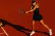 PARIS, FRANCE - JUNE 07: Maria Sharapova of Russia plays a backhand in her women's semi final match against Petra Kvitova of Czech Republic during day 12 of the French Open at Roland Garros on June 7, 2012 in Paris, France. (Photo by Clive Brunskill/Getty Images)