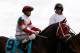 LOUISVILLE, KY - MAY 07: Jockey Javier Castellano, rding Derby Kitten #9, is escourted onto the track for the running of the 137th Kentucky Derby at Churchill Downs on May 7, 2011 in Louisville, Kentucky. (Photo by Rob Carr/Getty Images)