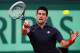 PARIS, FRANCE - JUNE 08: Novak Djokovic of Serbia plays a forehand in his men's singles semi final match against Roger Federer of Switzerland during day 13 of the French Open at Roland Garros on June 8, 2012 in Paris, France. (Photo by Clive Brunskill/Getty Images)