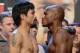 LAS VEGAS, NV - JUNE 08: Boxers Manny Pacquiao (L) and Timothy Bradley pose during the official weigh-in for their bout at the MGM Grand Garden Arena on June 8, 2012 in Las Vegas, Nevada. Pacquiao will defend his WBO welterweight title against Bradley on June 9 in Las Vegas. (Photo by Kevork Djansezian/Getty Images)