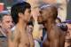 LAS VEGAS, NV - JUNE 08: Boxers Manny Pacquiao (L) and Timothy Bradley pose during the official weigh-in for their bout at the MGM Grand Garden Arena on June 8, 2012 in Las Vegas, Nevada. Pacquiao will defend his WBO welterweight title against Bradley on June 9 in Las Vegas. (Photo by Kevork Djansezian/Getty Images)