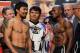 LAS VEGAS, NV - JUNE 08: Boxers Manny Pacquiao (L) and Timothy Bradley (R) pose during the official weigh-in for their bout at the MGM Grand Garden Arena on June 8, 2012 in Las Vegas, Nevada. Pacquiao will defend his WBO welterweight title against Bradley on June 9 in Las Vegas. (Photo by Kevork Djansezian/Getty Images)