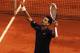 PARIS, FRANCE - JUNE 08: Novak Djokovic of Serbia celebrates victory in his men's singles semi final match against Roger Federer of Switzerland during day 13 of the French Open at Roland Garros on June 8, 2012 in Paris, France. (Photo by Matthew Stockman/Getty Images)