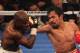LAS VEGAS, NV - JUNE 09: (R-L) Manny Pacquiao lands a right to the head of Timothy Bradley during their WBO welterweight title fight at MGM Grand Garden Arena on June 9, 2012 in Las Vegas, Nevada. (Photo by Jeff Bottari/Getty Images)