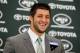 FLORHAM PARK, NJ - MARCH 26: Quarterback Tim Tebow addresses the media as he is introduced as a New York Jet at the Atlantic Health Jets Training Center on March 26, 2012 in Florham Park, New Jersey. Tebow, traded from the Denver Broncos last week, will be the team's backup quarterback according to Jets head coach Rex Ryan. Tebow, the 2007 Heisman Trophy winner, started 11 games in 2011 for Denver and finished with a 7-4 record as a starter. He led the Broncos to a playoff overtime win against the Pittsburgh Steelers in the first round before eventually losing to the New England Patriots in the next round. (Photo by Mike Stobe/Getty Images)