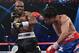 LAS VEGAS, NV - JUNE 09: (L-R) Timothy Bradley lands a left to the head of Manny Pacquiao during their WBO welterweight title fight at MGM Grand Garden Arena on June 9, 2012 in Las Vegas, Nevada. (Photo by Kevork Djansezian/Getty Images)