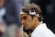 LONDON, ENGLAND - JUNE 29: Roger Federer of Switzerland looks dejected during his quarterfinal round match against Jo-Wilfried Tsonga of France on Day Nine of the Wimbledon Lawn Tennis Championships at the All England Lawn Tennis and Croquet Club on June 29, 2011 in London, England. (Photo by Julian Finney/Getty Images)